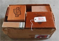 Box full of vintage wooden cigar boxes