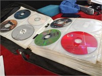 200+ Good DVDs in a Case - No telling what you'll
