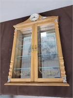 Clock with display cabinate