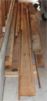 pile of assorted lumber up to 14' long. Buyer must