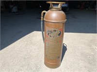 Antique brass fire extinguisher