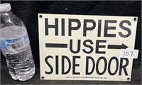 "HIPPIES USE SIDE DOOR" METAL PLACARD