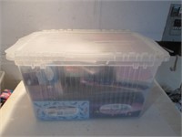 PLASTIC CONTAINER FULL WITH VARIOUS ITEMS