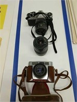 Lot Of Cameras And Lens As Shown