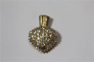 A 14KT Gold And Diamond Pendant