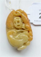 Jade pendant of a qilong on corn cob,