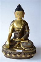 Fine Chinese gilt and patinated bronze Buddha,
