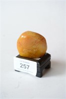 Small amber coloured boulder seal,