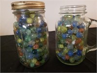 2) quart jars of marbles