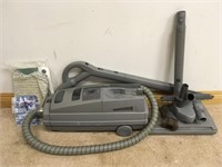ELECTROLUX VACUUM WITH BAGS & ATTACHEMENTS- WORKS