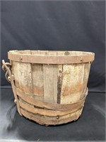 Very rustic wooden barrel with metal hanger 19"w