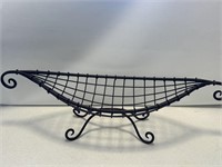 Metal banana boat fruit basket measures 30 inches