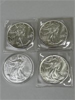 Four 1 Oz Fine Silver Liberty Dollars.