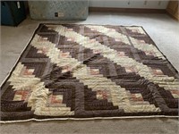 Handmade quilt measuring 95"x92" brown tones