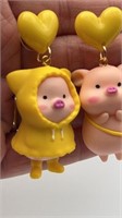 Fun pig earrings, 3D with yellow hearts above,