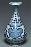 A YUAN DYNASTY BLUE AND WHITE PORCELAIN VASE