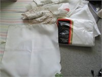 Lot of doilies & new double bed fitted sheet