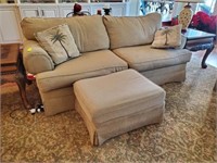 2 CUSHION UPHOLSTERED SOFA AND OTTOMAN