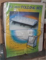roll-away folding bed, like new in box