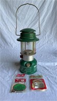 COLEMAN OIL LAMP WITH ACCESSORIES
