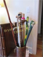 ASSORTED WALKING STICKS IN STAND