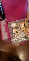 Plastic storage boxes and art supplies