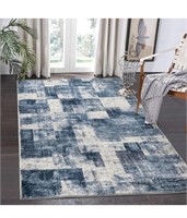 Abstract blue and ivory area rug 8x10’