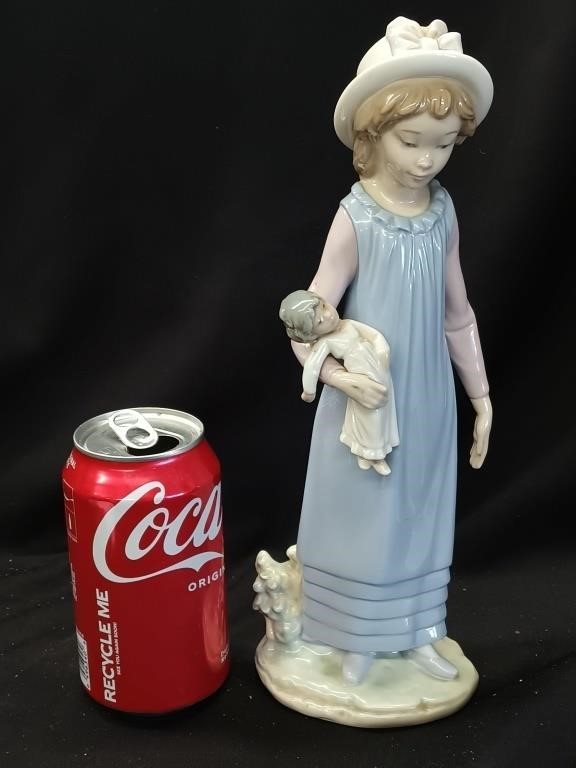 Lladro figurine 11.5"h, Girl with doll look at