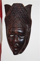 Carved African tribal mask with number inscribed