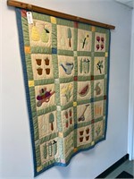 QUILT WITH RACK