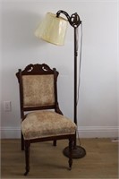 ANTIQUE UPHOLSTERED CHAIR & CAST FLOOR LAMP