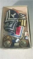 Box with some thimbals military patches an old
