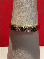 Sterling silver ring with green and white CZ