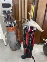 2 gold club bags and clubs