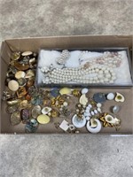 Assortment of earrings and jewelry sets