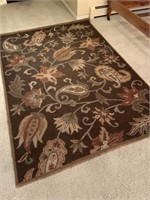 Brown floral wool rug- 7 ft by 5 ft