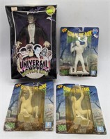 (J) Movie monster figurines in boxes