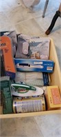box of misc door alarms, cleaning supplies