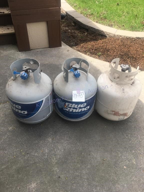 Three propane tanks - appear to be empty