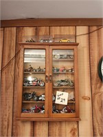 Two-door wooden display case.  Cabinet only..