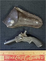 GREAT ANTIQUE CAST TOY GUN AND HOLSTER