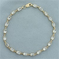 Aquamarine Tennis Bracelet in 10k Yellow Gold