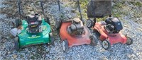 3 push mowers for parts.