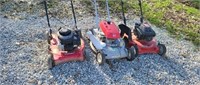 3 push mowers for parts.