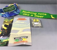 John Deere hat, playing cards, and other items