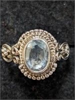 $200 Silver Blue Topaz Ring