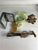 Vintage hand mixer, wall decor, tape, bowl with