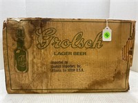 GROLCH PORCELAIN TOP AMBER COLORED EMBOSSED BEER