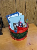 Basket with assortment of greeting cards, and cup