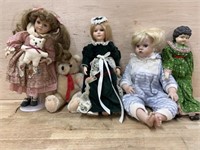 Box of 4 porcelain dolls and teddy bear